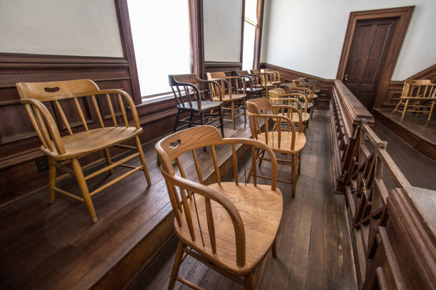 istock Empty Juror Box In American Courtroom 1149686760