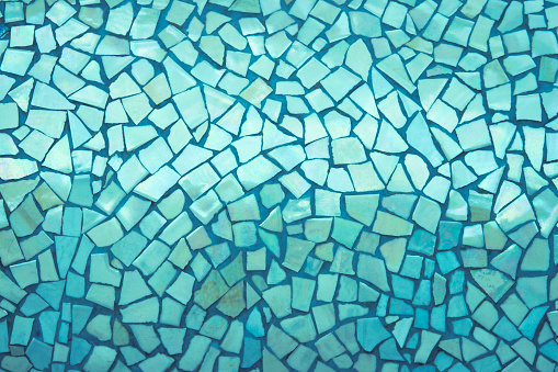 Broken tiles mosaic seamless pattern. Green tile real wall high resolution real photo or brick seamless with texture interior background. Abstract wallpaper irregular in bathroom.