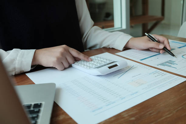 istock Business People Meeting Design Ideas  with pen analyzing financial documents professional investor working new start up project. Concept. business planning in office. 1149697394