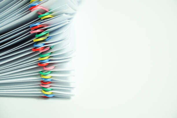 istock Pile of documents on the desk. white background. 1149698213
