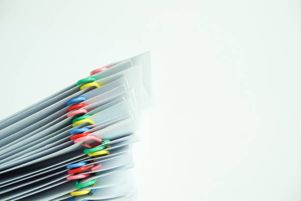 istock Pile of documents on the desk. white background. 1149698221