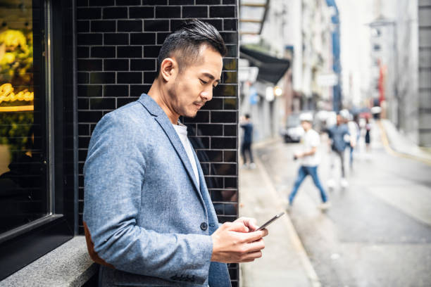 istock Asian businessman using his smartphone 1149705509