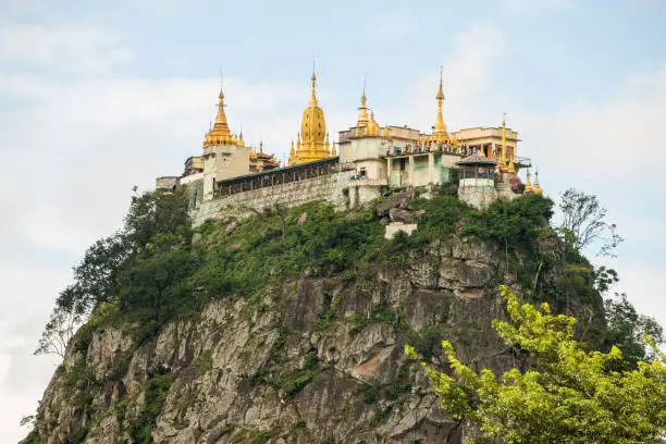 Mount Popa an ancient volcano and home of "Nat" the Burmese mythology ghost. This is an extinct volcano in Myanmar.