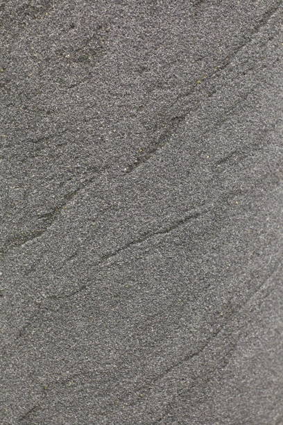 istock Rough surface texture background Sandstone exotic stone cut from rock layer sand, desert sand 1149712545