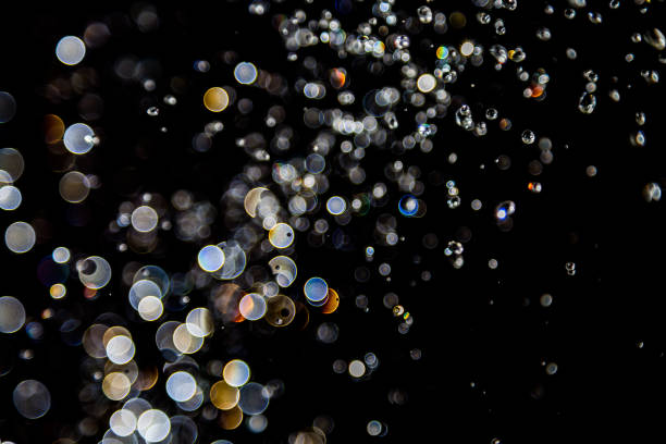 istock bokeh of water drops levitating in the air reflection 1149713756