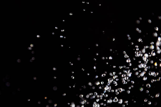 istock bokeh of water drops levitating in the air reflection 1149714034