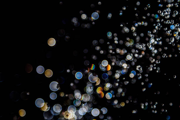 istock bokeh of water drops levitating in the air reflection 1149714176