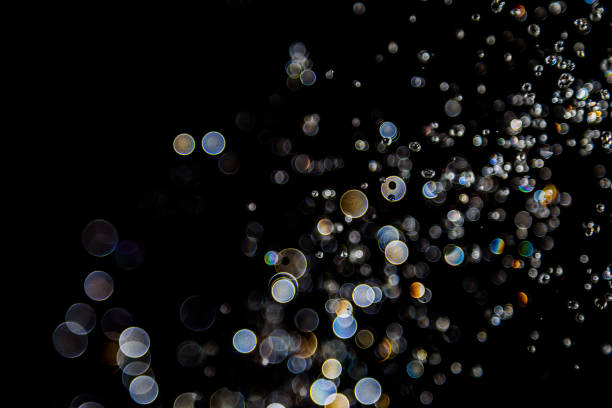 istock bokeh of water drops levitating in the air reflection 1149714790