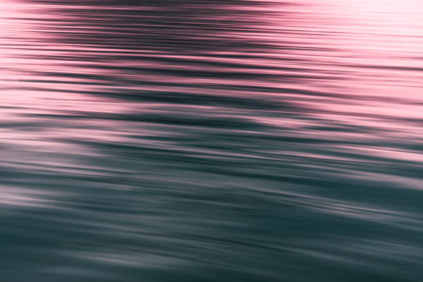 istock Abstract Background, Pink Sunset, Water Surface, Play of Ripples 1149716467