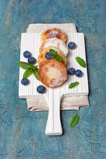 istock Tasty cottage cheese pancakes with blueberries 1149717892