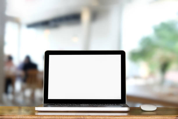 istock Mockup laptop computer on wooden desk with montage a room. 1149719051