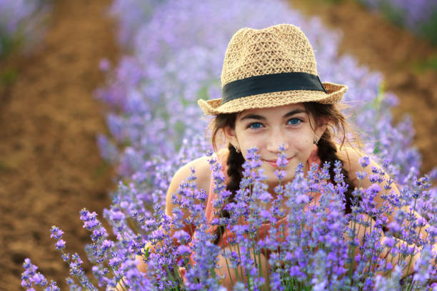 istock Beautiful girl in lavender field 1149719382