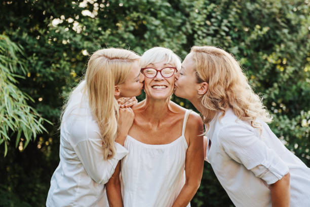 istock Three women enjoying outdoors, talking and laughing 1149722574
