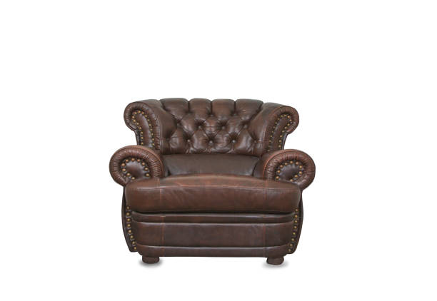 istock Old vintage brown leather chair in empty room 1149725002