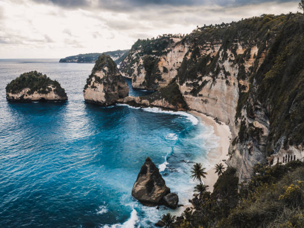 istock Beautiful beach below rocks at sunset. Diamond beach, Nusa Penida 1149726403