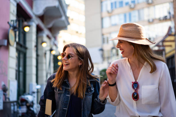 istock Smiling tourists in a walk 1149728741