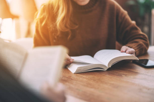 istock people sitting and enjoyed reading books together 1149731468