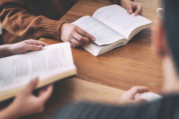istock people sitting and enjoyed reading books together 1149731575