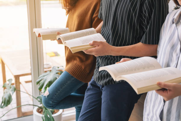 istock people enjoyed reading books together 1149731644