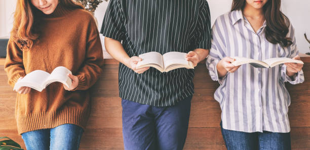 istock people enjoyed reading books together 1149731669
