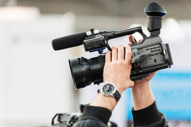 istock Cropped Hands Of Man Photographing With Camera 1149736088