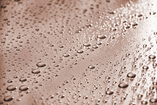 istock Close up water drops on metal surface can be used for web design 1149738384