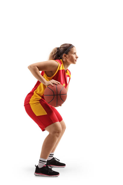 istock Female basketball player passing a ball 1149745901