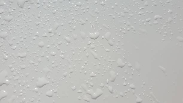 istock Abstract white pattern with droplets of water on white metal 1149746155
