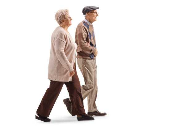 istock Senior husband and wife walking 1149747459