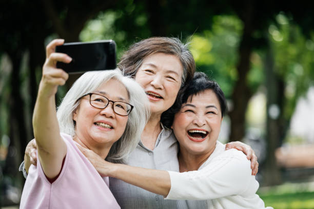 istock Three Taiwanese Ladies Taking Selfie Together 1149747736