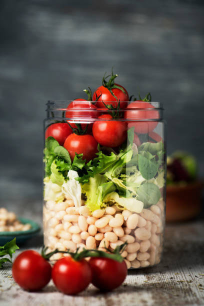 istock jar salad with white beans and vegetables 1149748101