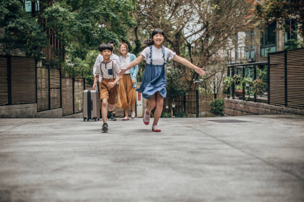 istock Happy children returning home from vacation 1149753973
