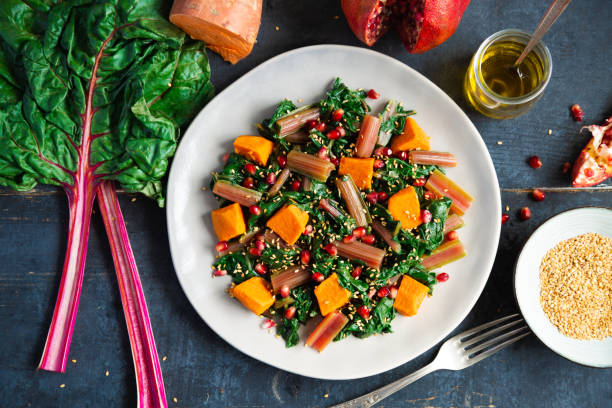 istock Swiss chard with sweet potato and pomegranate 1149754763