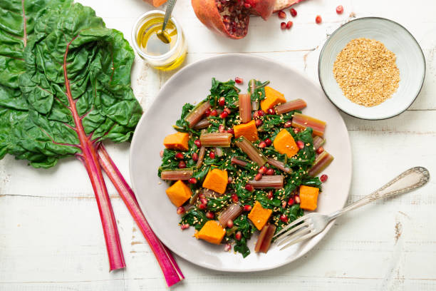 istock Swiss chard with sweet potato and pomegranate 1149754764