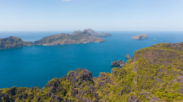 istock Seascape with tropical islands. Rocky islands with white beaches 1149755031