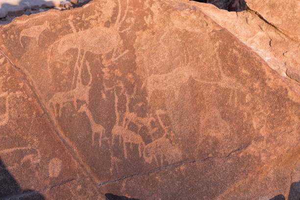 istock rock carvings by Twyfelfontein 1149757530