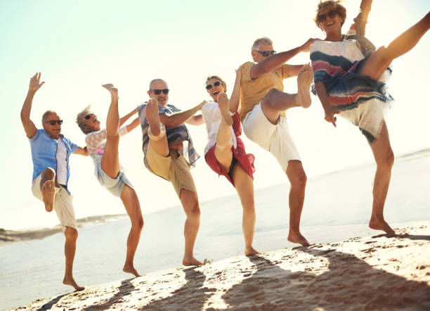 istock Happiness is... A beach day with friends 1149757552