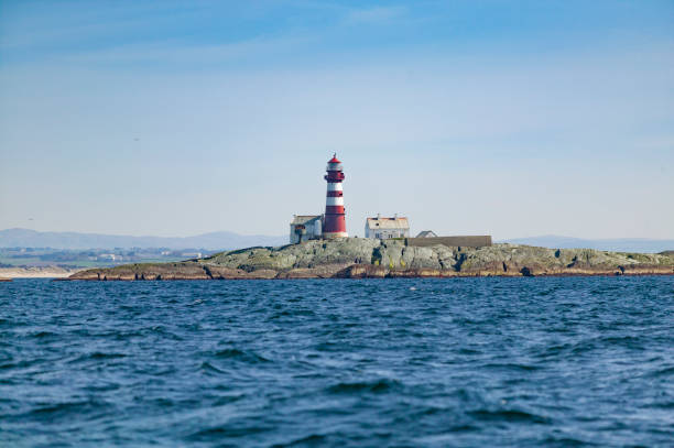 istock Lighthouse in a Norway fjord 1149758222