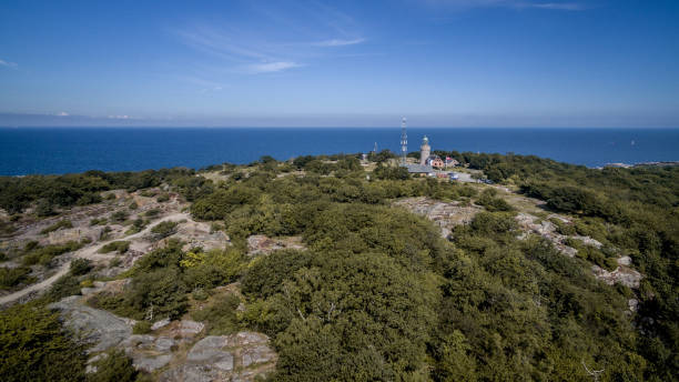 istock Lighthouse above the sea 1149759005