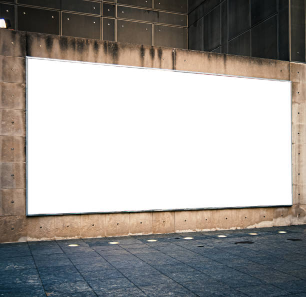 istock Large blank horizontal advertising bilboard mockup in city or town. Copy space. 1149759399