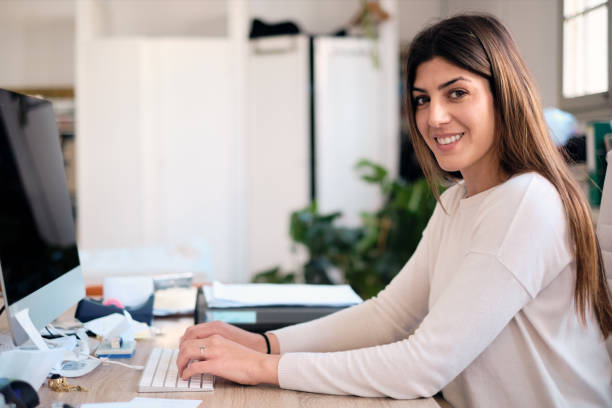 istock Woman working in small business's office. 1149763603