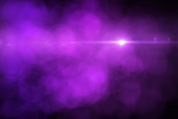 istock Lens Flare and Bokeh, Neon Colors Black Background 1149775909