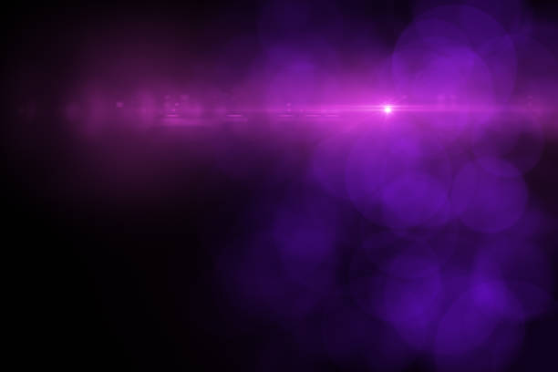 istock Lens Flare and Bokeh, Neon Colors Black Background 1149775959