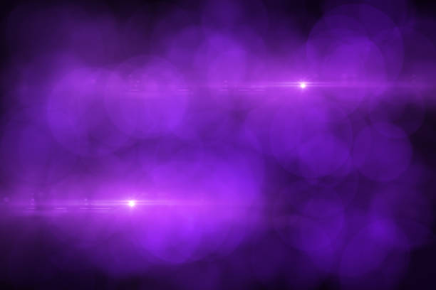 istock Lens Flare and Bokeh, Neon Colors Black Background 1149776533