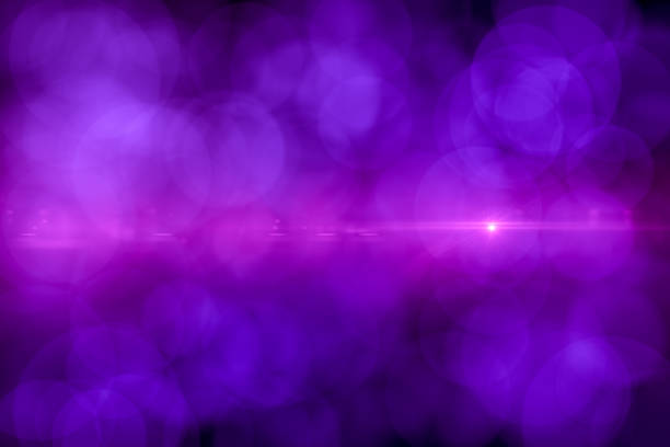 istock Lens Flare and Bokeh, Neon Colors Black Background 1149776933