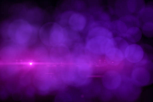 istock Lens Flare and Bokeh, Neon Colors Black Background 1149777328