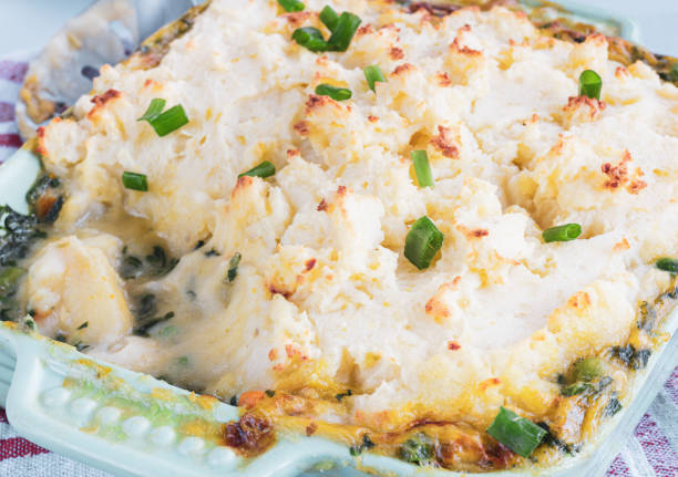 istock Classic Fish Pie with Mashed Potato in a Baking Tray, Close-Up Photo. Fisherman's pie, Traditional British   Dish. 1149780756
