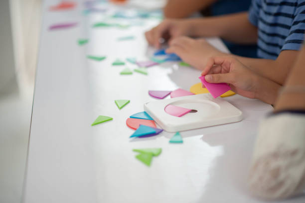istock Group of Students study math with teacher in the classroom 1149783706