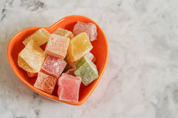 istock colorful turkish delights in a heart shaped bowl 1149785716