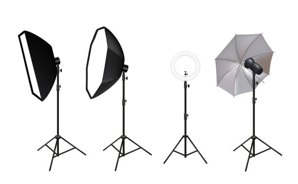 istock Realistic spotlights. Photo video accessories for studio softboxes spotlights vivid light shine glow effects vector pictures 1149786943